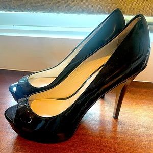 Barney’s black patten leather heels